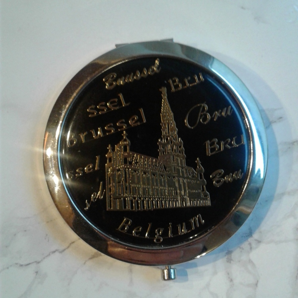 Gold & black hand mirror from Belgium